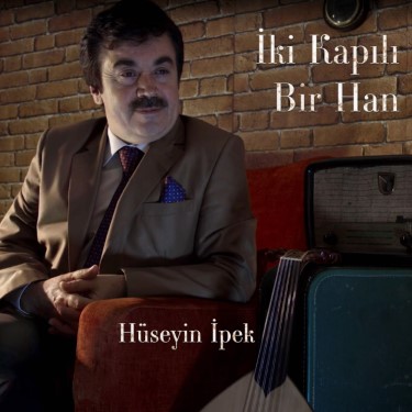 İki Kapılı Bir Han - Hüseyin İpek